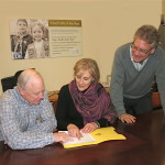 ESCC's Jerry Lewis and Mark Grote discuss strategic plan updats with Liz Carter, Executive Director, St. Vincent de Paul.
